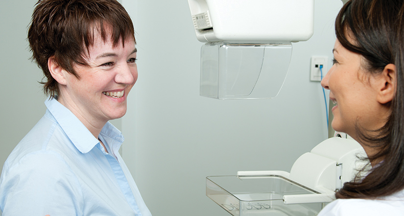 Woman having conversation with her female doctor.