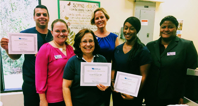 ix happy providers after receiving certificate of patient care advocacy program