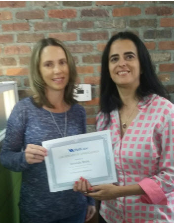 Millie Hurtado after receiving her certificate of completion.